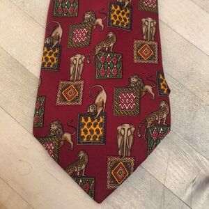 Men’s Salvatore Ferragamo red tie with animals